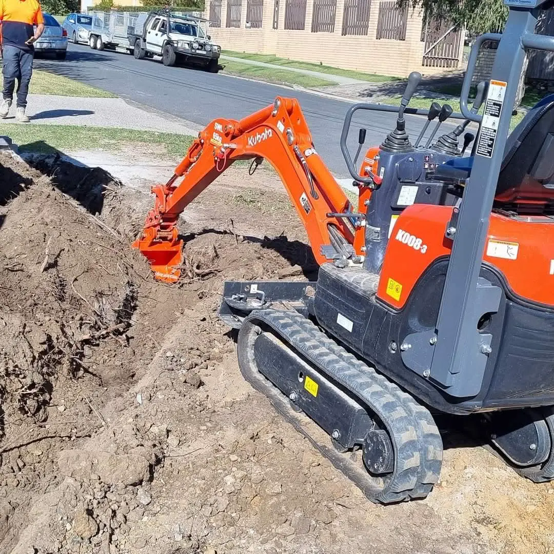 Kubota K008 mini excavator trench digging Brisbane