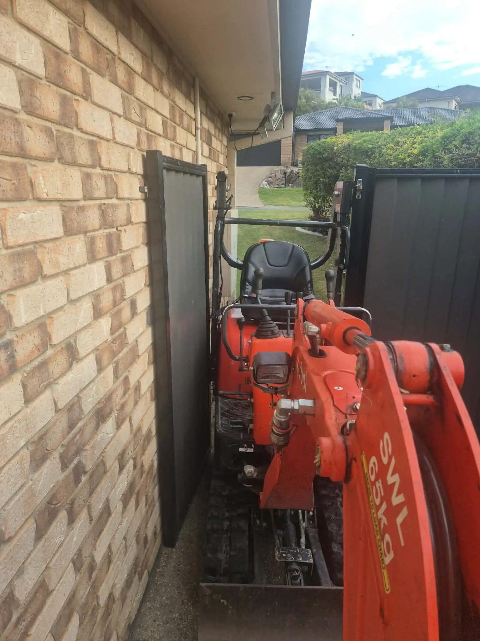Tight access excavator narrow side gate Brisbane